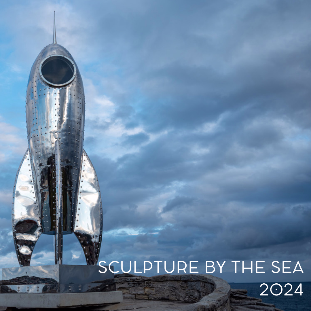 Large scale artwork of a rocket poised at the headland of bondi with dark sky in background. pdf